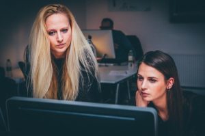 women looking at computer